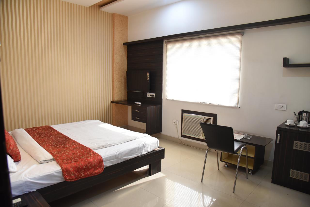 Hotel Pink Pearl Raigarh Pokoj fotografie